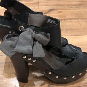 Black leather with brown heel